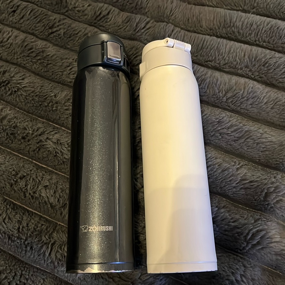 Two Zojirushi insulated bottles